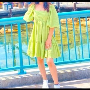 Lantern Sleeve Shirred Back Raffle Hem Dress